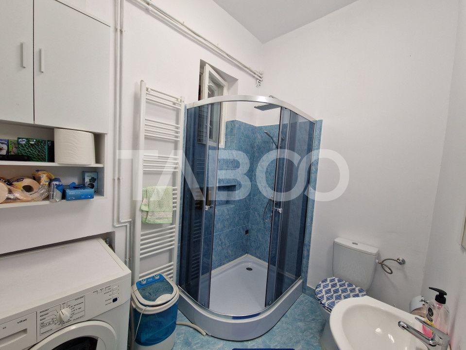 Apartament central 4 camere spatiu comercial garaj si pivnita Sibiu – fotografia 7 din 16