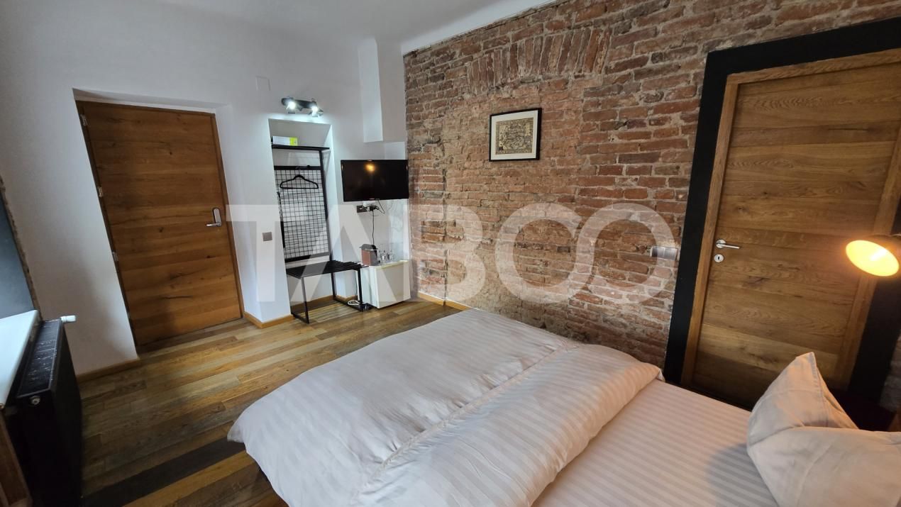 Doua garsoniere de vanzare pentru regim hotelier zona Orasului De jos – fotografia 2 din 12