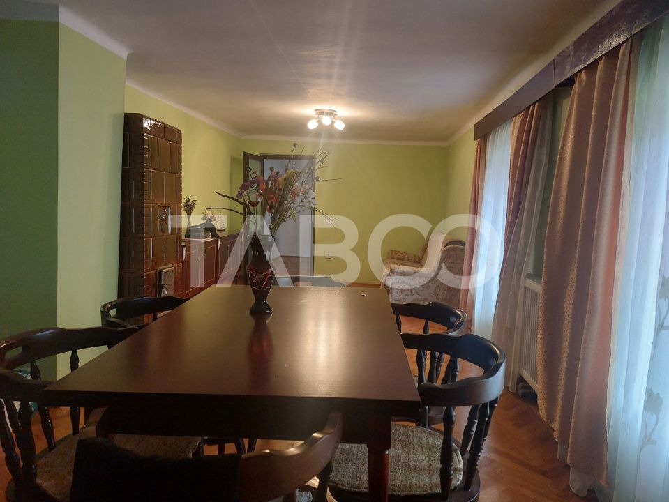Casa in zona centrala 5 camere 2 bucatarii 3 bai curte comuna Cisnadie – fotografia 6 din 28