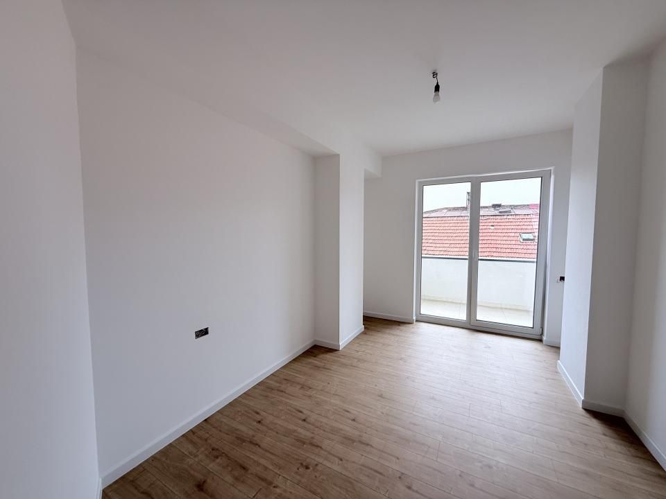 Apartament 2 camere bloc nou, mp 44,1 utili cu 8,32 balcon, zona Centrala – fotografia 2 din 6