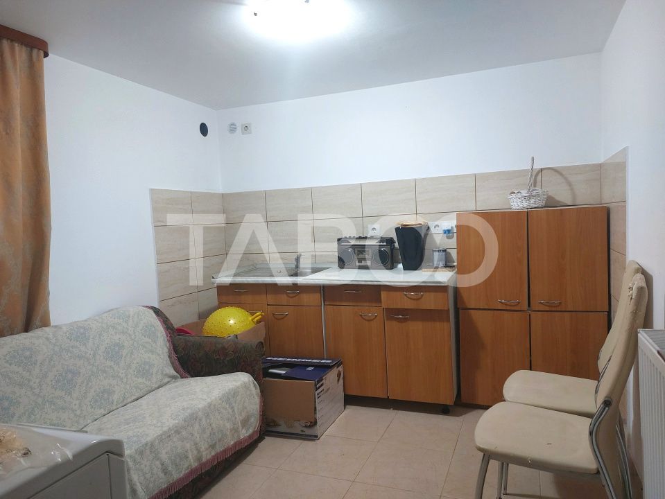 Casa in zona centrala 5 camere 2 bucatarii 3 bai curte comuna Cisnadie – fotografia 8 din 28