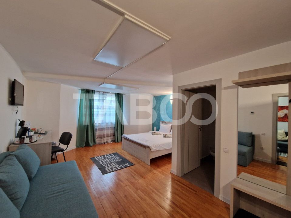 Casa de inchiriat cu 4 nivele pentru regim hotelier Strand Sibiu – fotografia 1 din 46