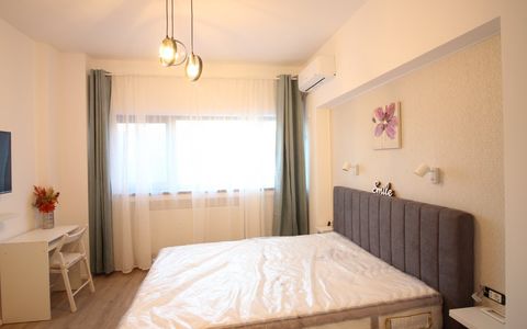 Piața Universității – 2 camere, 2 băi, mobilate modern, etaj 1/8, ideale Airbnb