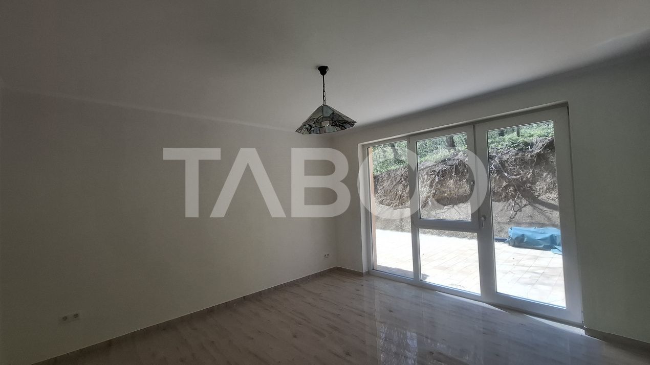 Casa de vanzare 405 mp utili 2 garaje 250 mp terase Slimnic Sibiu – fotografia 14 din 19