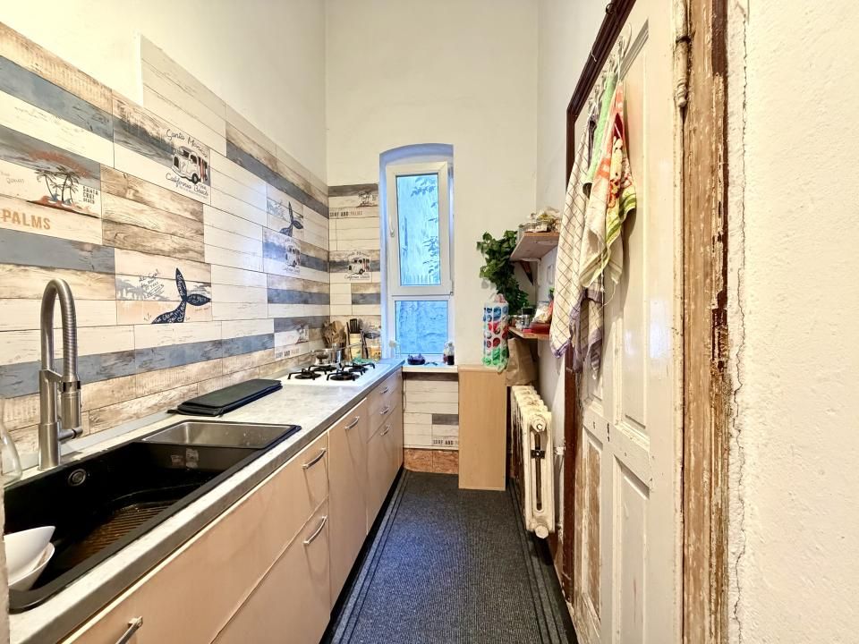 Casa cu 4 camere, 136 mp utili, curte comuna - Zona Centrala – fotografia 8 din 9