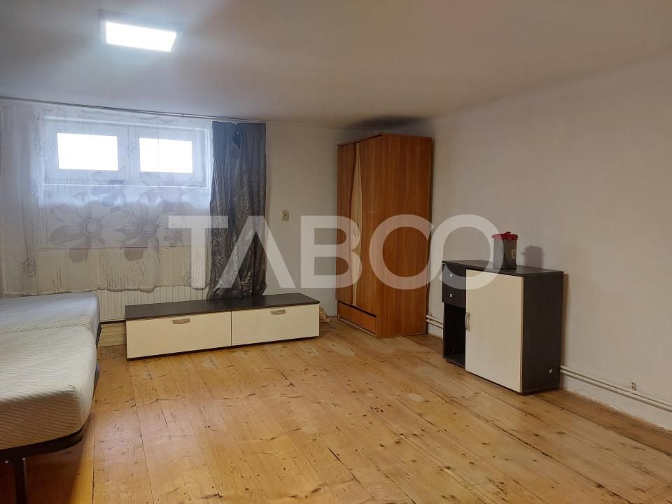 Casa mica 3 dormitoare curte mica 60 mp zona Lupeni Sibiu – fotografia 7 din 13