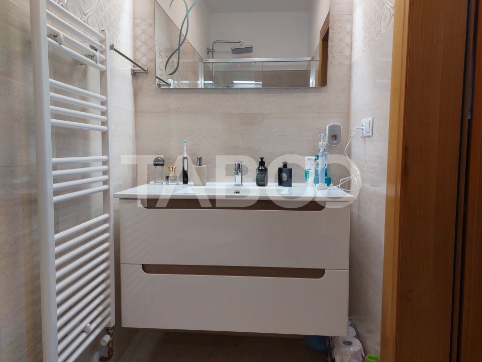 Casa 109 mp 4 camere pivnita terasa loc parcare curte comuna Cisnadie – fotografia 10 din 24