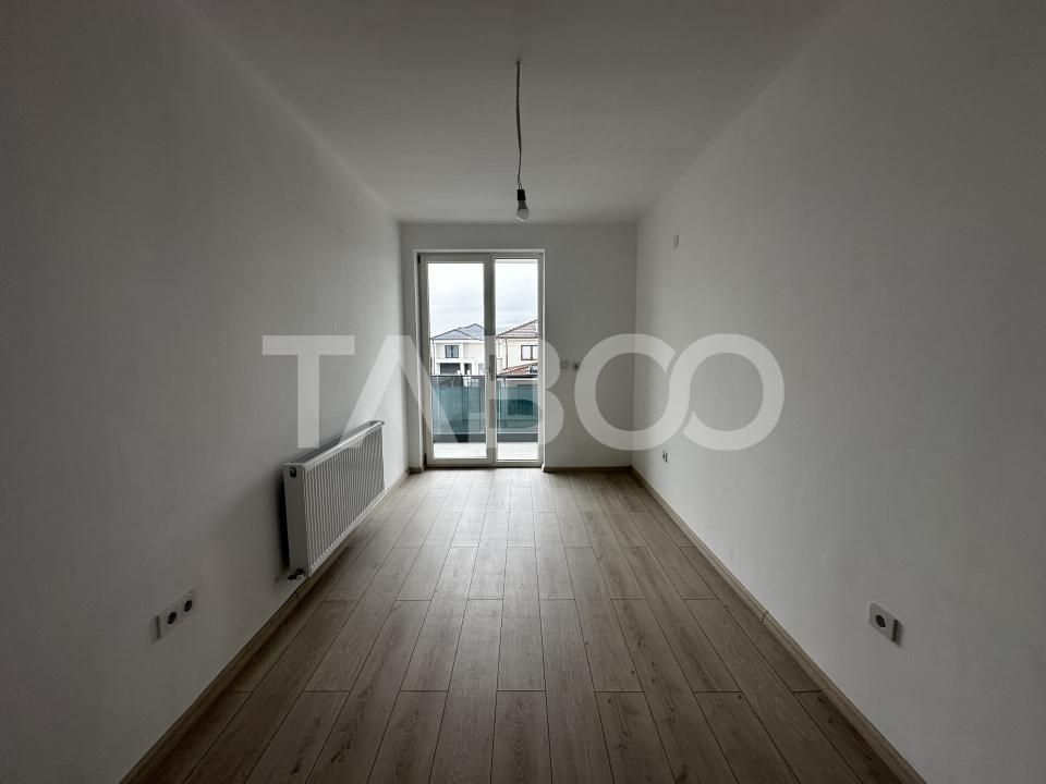 Apartament decoamandat 71 mpu 2 camere dressing balcon etaj 1 Selimbar – fotografia 4 din 7