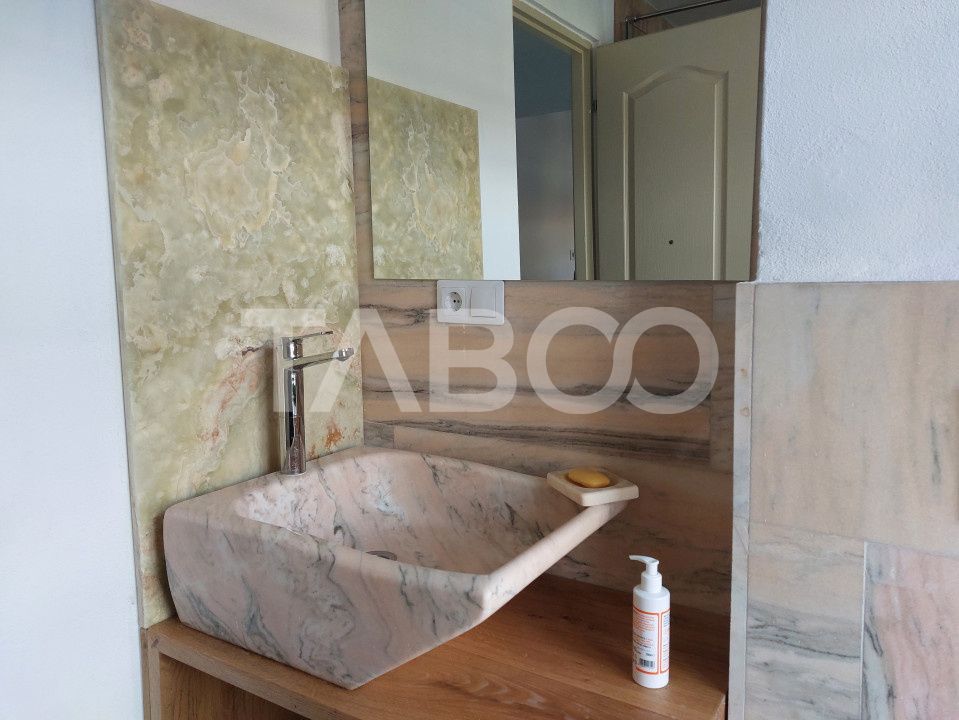Apartament de vanzare 105 mp 3 camere curte 340 mp in acte Cisnadie – fotografia 18 din 27