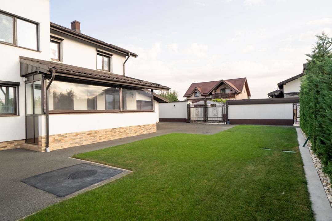 Casă premium de vânzare în Adunații Copăceni – 326 mp utili, 492 mp teren, garaj – fotografia 9 din 28