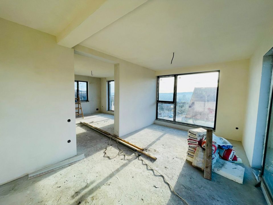 Duplex cu arhitectură deosebită și panoramă spre oraș | Dâmbul Rotund – fotografia 7 din 13
