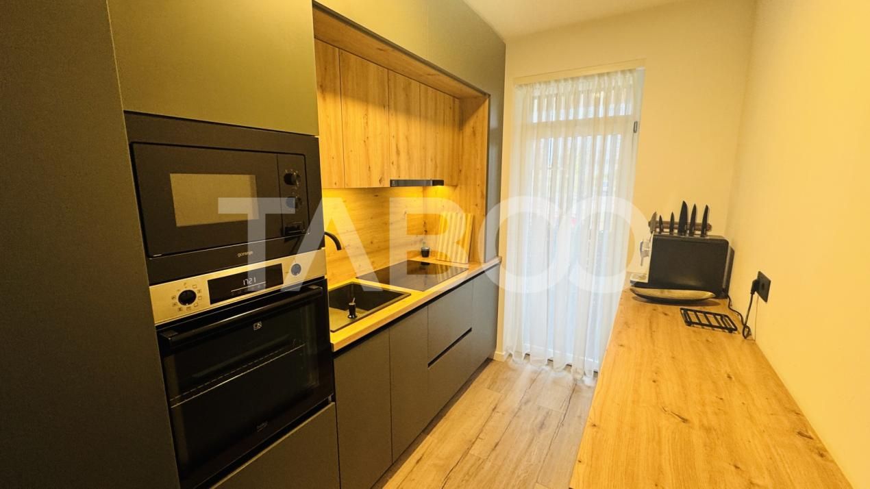 Apartament modern 63mpu 3 camere 2 bai 2 parcari de vanzare Sibiu – fotografia 3 din 11