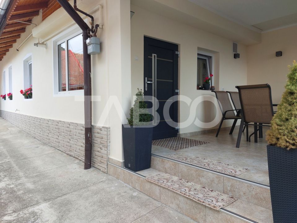 Casa 109 mp 4 camere pivnita terasa loc parcare curte comuna Cisnadie – fotografia 21 din 24