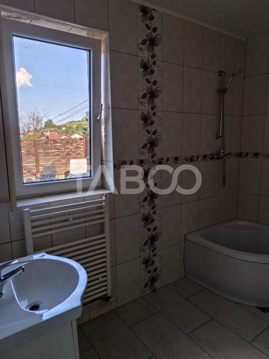 Casa de vanzare  cu garaj si curte 147 mpu in Sura Mare Sibiu – fotografia 9 din 11