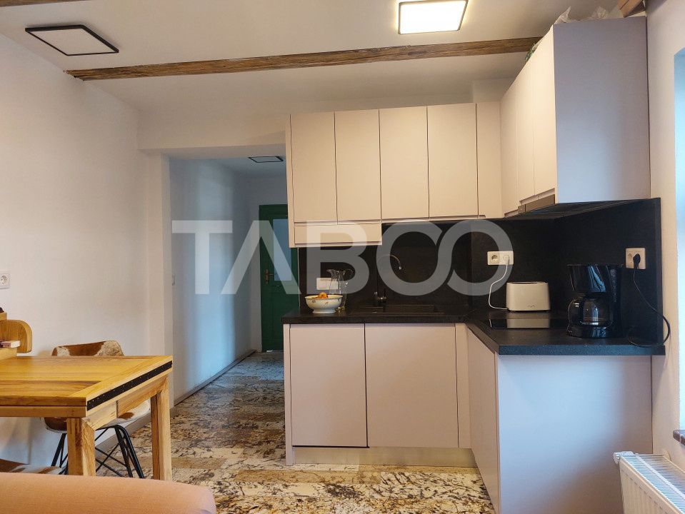 Casa de vanzare 3 camere 2 bucatarii 3 bai teren 340 mp Cisnadie – fotografia 24 din 36