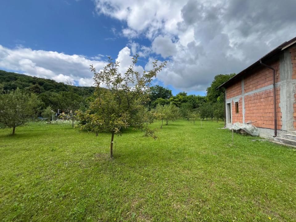 Casă P+M 4 dormitoare 188 mp și teren de 3.400 mp cu livadă in Pucioasa-Sat – fotografia 13 din 19