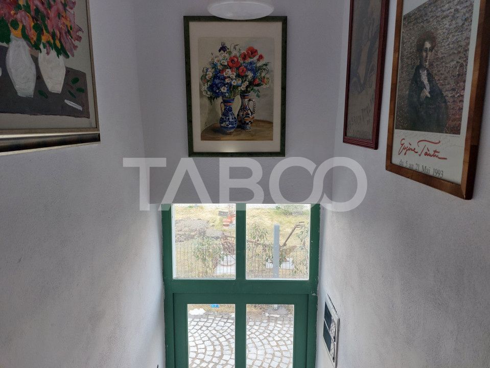 Casa de vanzare 3 camere 2 bucatarii 3 bai teren 340 mp Cisnadie – fotografia 31 din 36