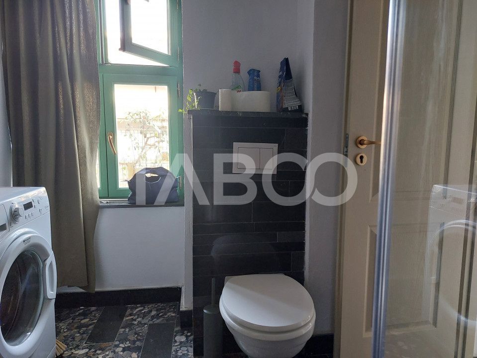 Casa de vanzare 3 camere 2 bucatarii 3 bai teren 340 mp Cisnadie – fotografia 28 din 36