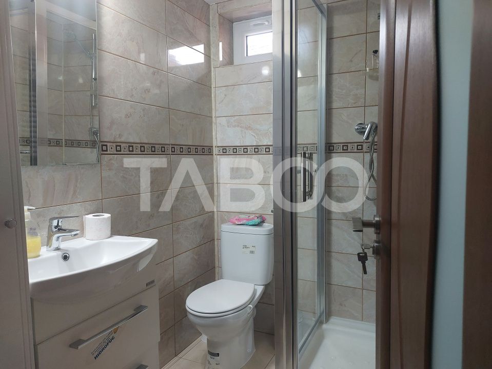 Casa in zona centrala 5 camere 2 bucatarii 3 bai curte comuna Cisnadie – fotografia 9 din 28