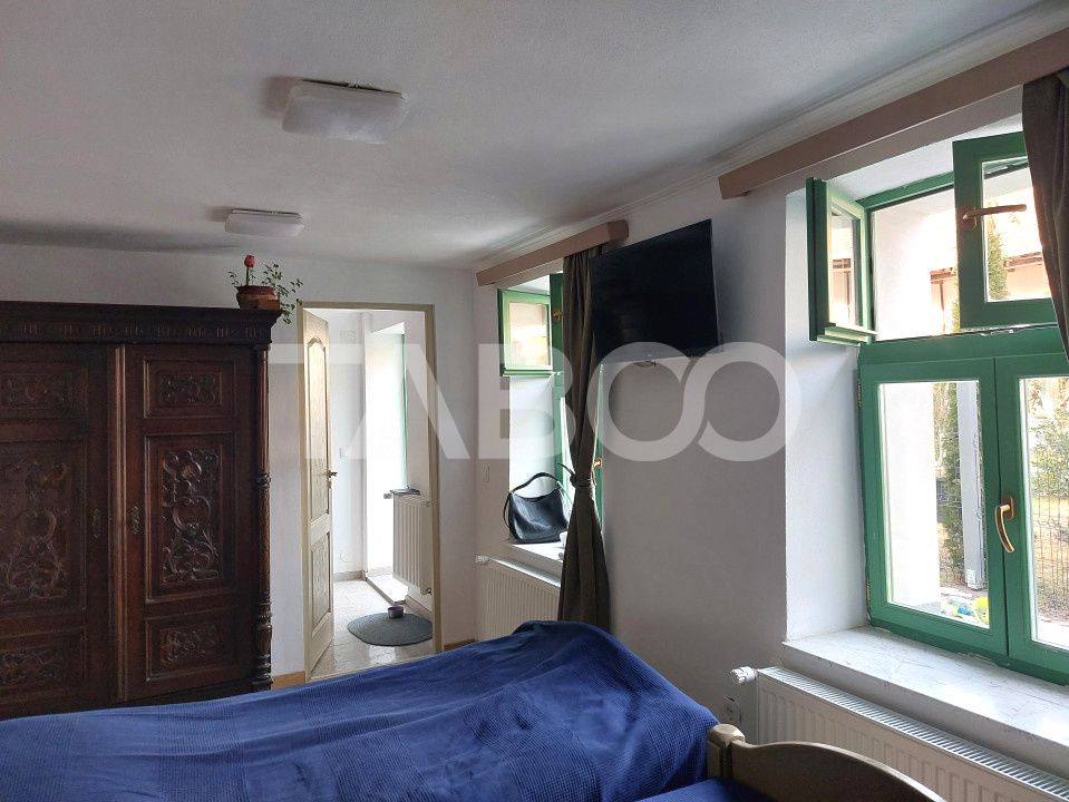 Casa de vanzare 3 camere 2 bucatarii 3 bai teren 340 mp Cisnadie – fotografia 23 din 36