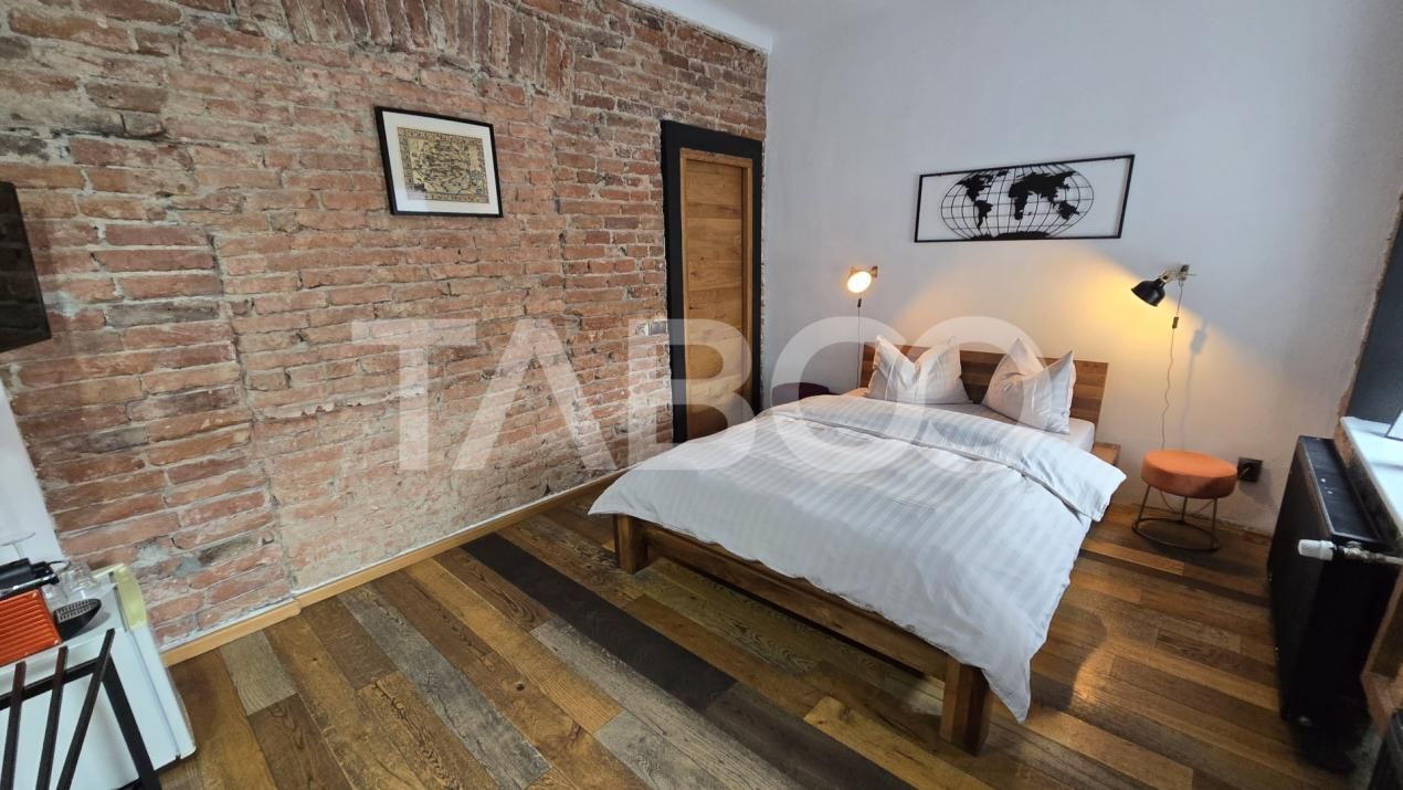Doua garsoniere de vanzare pentru regim hotelier zona Orasului De jos – fotografia 1 din 12