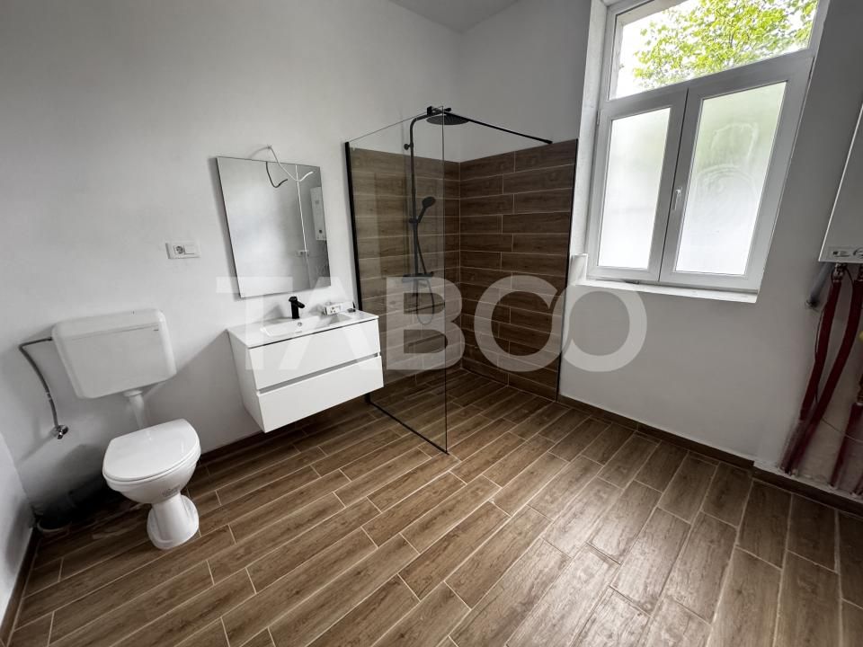Apartament renovat la casa cu 3 camere 60 mpu pivnita Piata Cluj Sibiu – fotografia 4 din 11