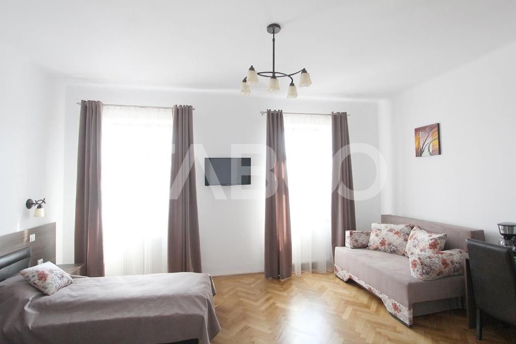 4 garsoniere pregatite pentru regim hotelier in Centrul Istoric Sibiu – fotografia 31 din 31