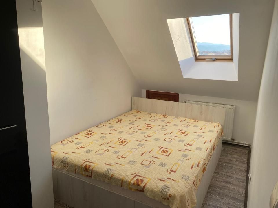 Apartament la mansarda zona centrala – fotografia 7 din 15