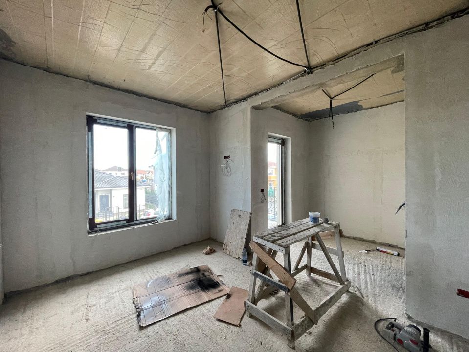 Duplex 5 camere despartit prin garaj - Mosnita Noua – fotografia 8 din 12
