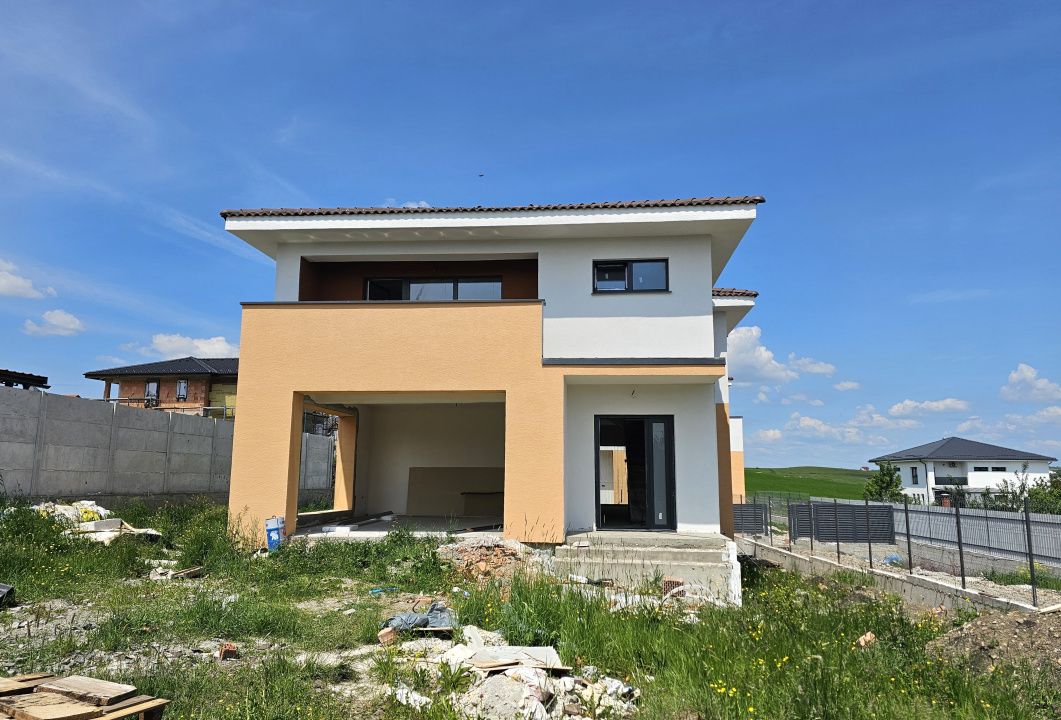 Casa individuala cu garaj si terase generoase in Chinteni – fotografia 4 din 21