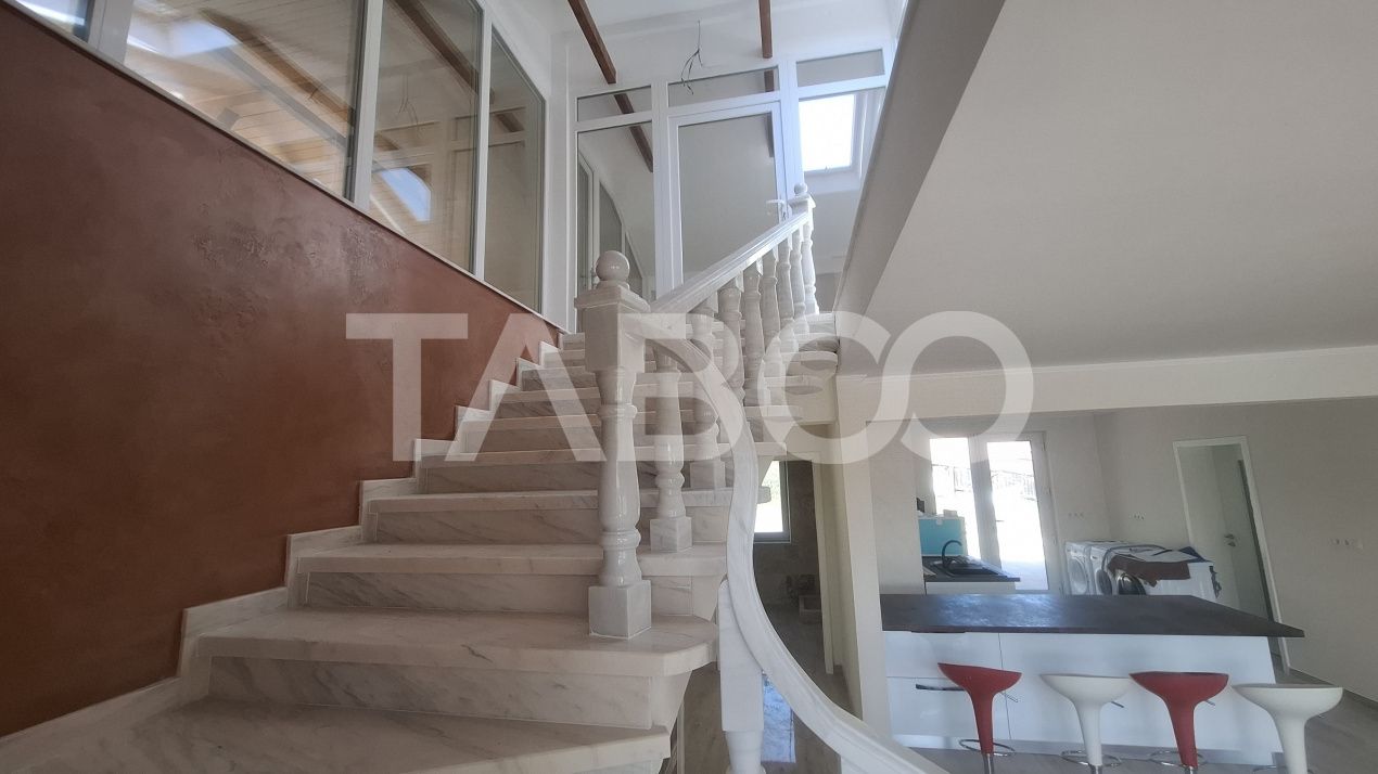 Casa de vanzare 405 mp utili 2 garaje 250 mp terase Slimnic Sibiu – fotografia 9 din 19