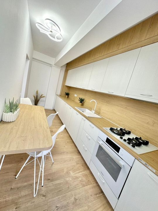 Apartament 2 camere 55 mp utili, semidecomandat, finisat,LUX zona Terra – fotografia 2 din 22