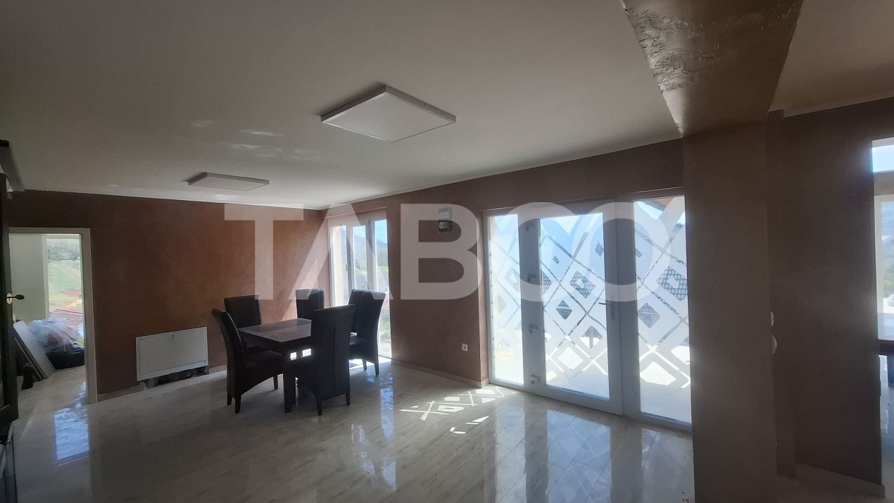Casa de vanzare 405 mp utili 2 garaje 250 mp terase Slimnic Sibiu – fotografia 15 din 19