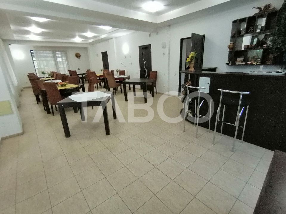 Pensiune 13 camere 16 bai sauna piscina si teren 1565 mp Cisnadioara – fotografia 38 din 42