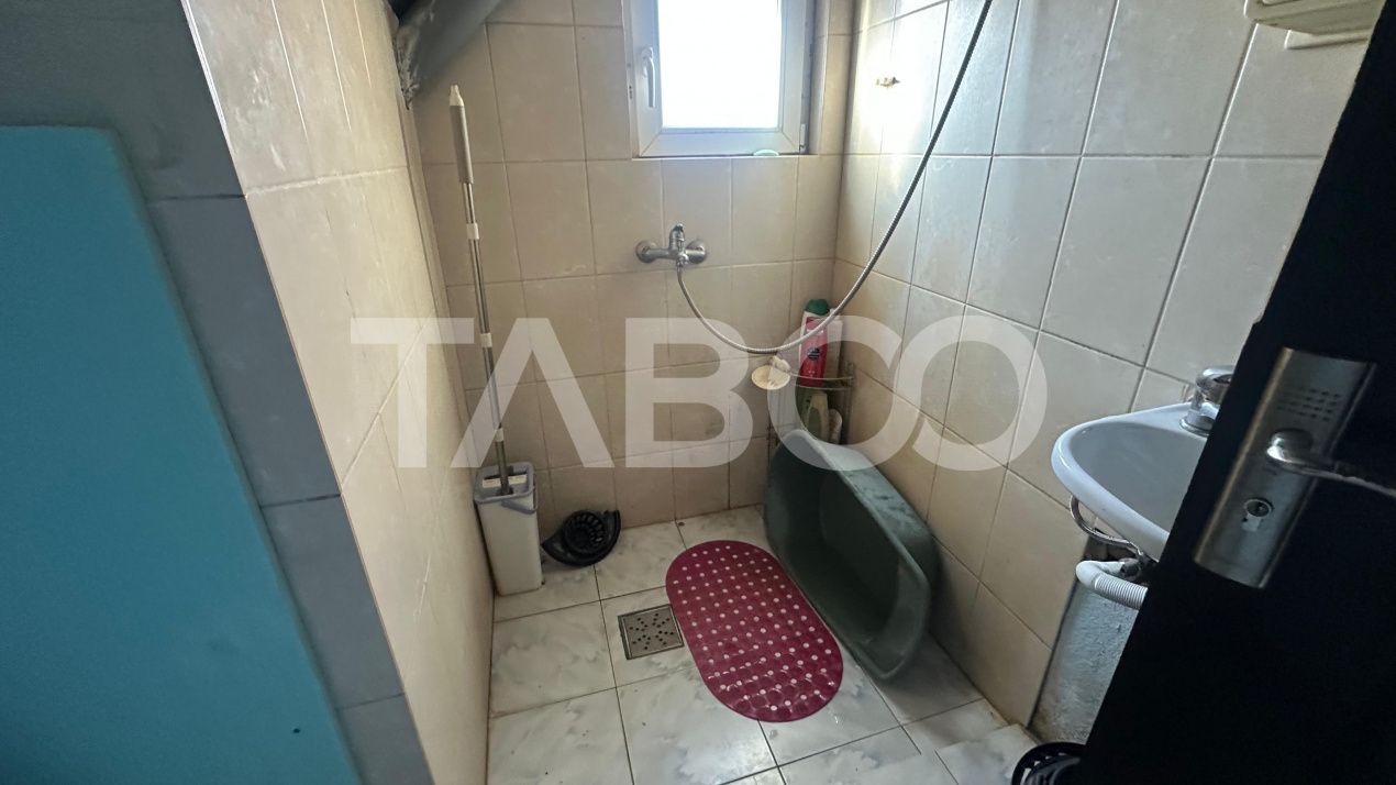 Casa individuala 4 camere cu curte de 550 mp 2 bai Cristian Sibiu – fotografia 7 din 11