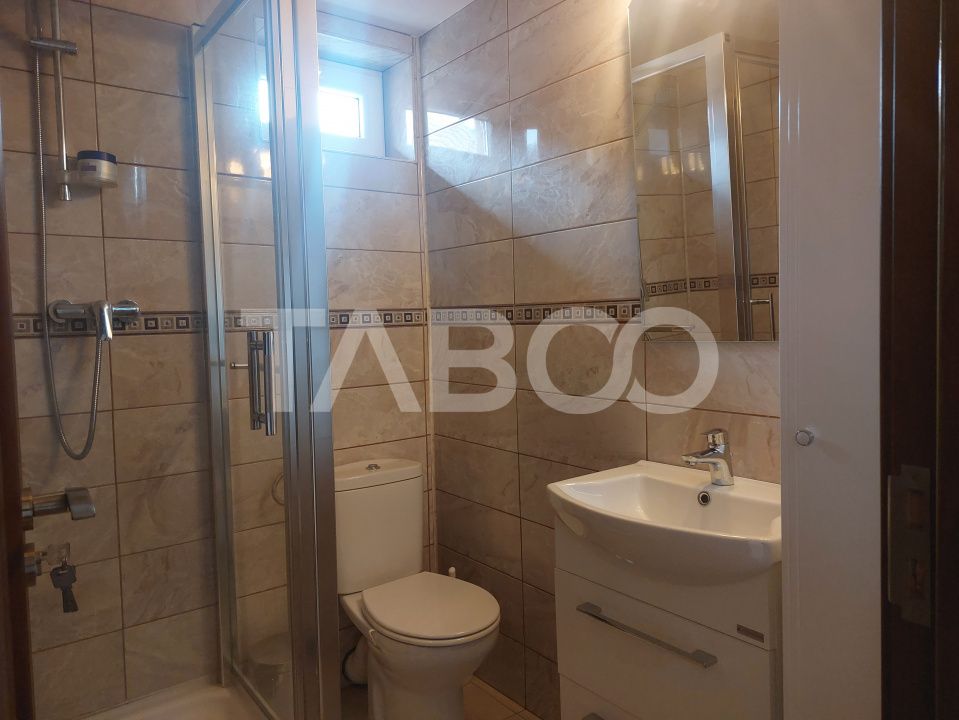 Casa in zona centrala 5 camere 2 bucatarii 3 bai curte comuna Cisnadie – fotografia 10 din 28