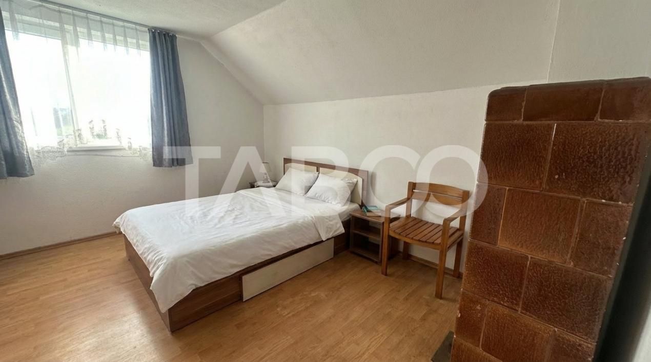 Casa individuala 4 camere cu curte de 550 mp 2 bai Cristian Sibiu – fotografia 3 din 11
