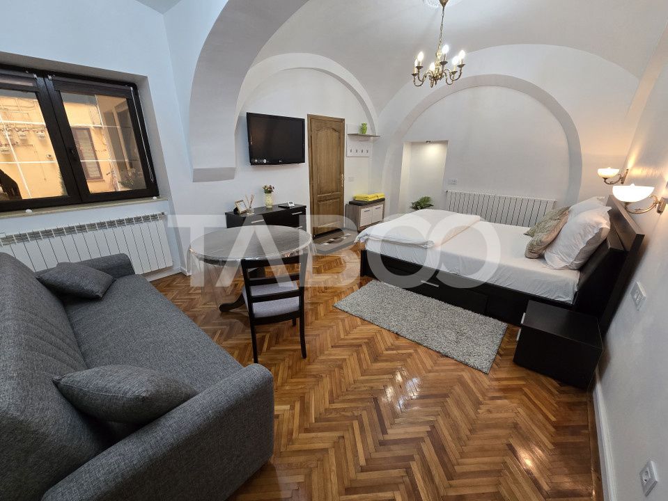 3 garsoniere functionale in regim hotelier in Centrul Istoric Sibiu – fotografia 1 din 14