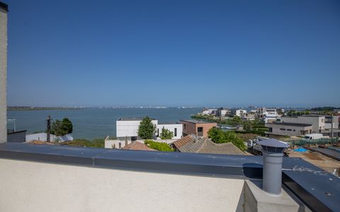 Vilă P+1 cu vedere la lac – terasă panoramică 50,2 mp, teren 212 mp