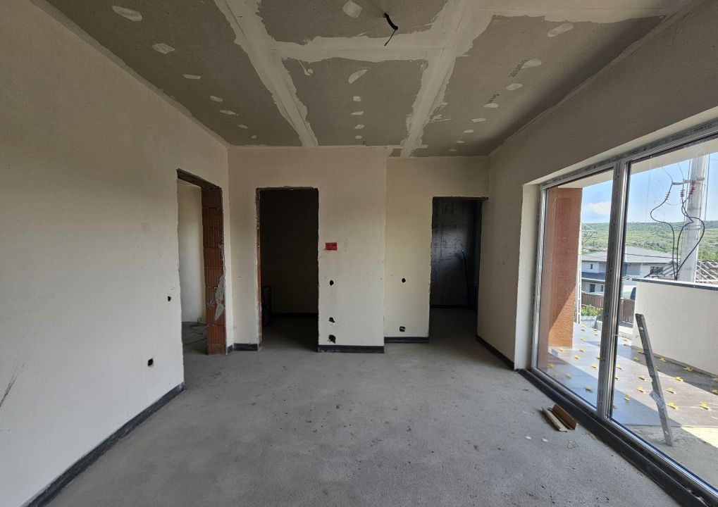 Casa individuala cu garaj si terase generoase in Chinteni – fotografia 13 din 21
