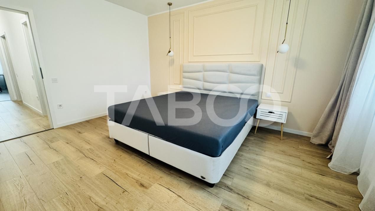 Apartament modern 63mpu 3 camere 2 bai 2 parcari de vanzare Sibiu – fotografia 9 din 11
