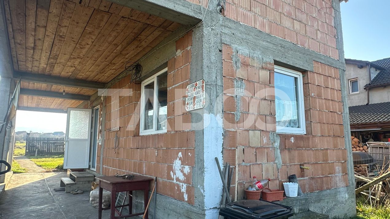 Casa individuala 4 camere cu curte de 550 mp 2 bai Cristian Sibiu – fotografia 5 din 11