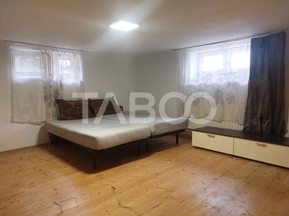 Casa mica 3 dormitoare curte mica 60 mp zona Lupeni Sibiu – fotografia 10 din 13