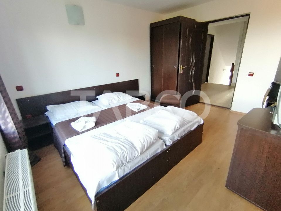 Pensiune 13 camere 16 bai sauna piscina si teren 1565 mp Cisnadioara – fotografia 29 din 42