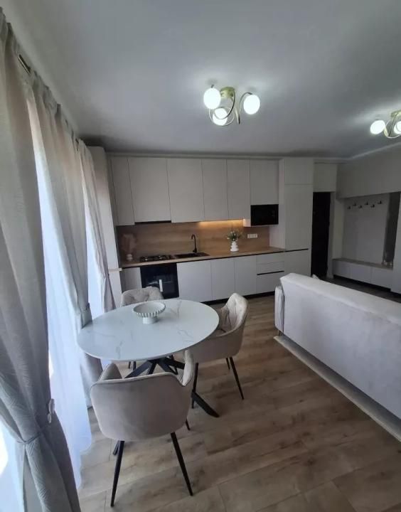 Apartament 2 camere ultrafinisat, balcon 8 mp și parcare | Baciu – fotografia 2 din 9