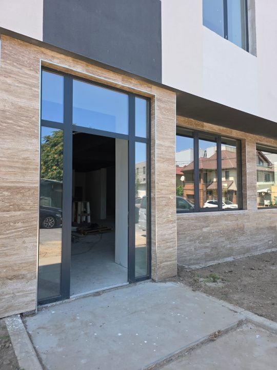 Clădire modernă cu regim D+P+3, situată în zona Faleza Nord – fotografia 1 din 43