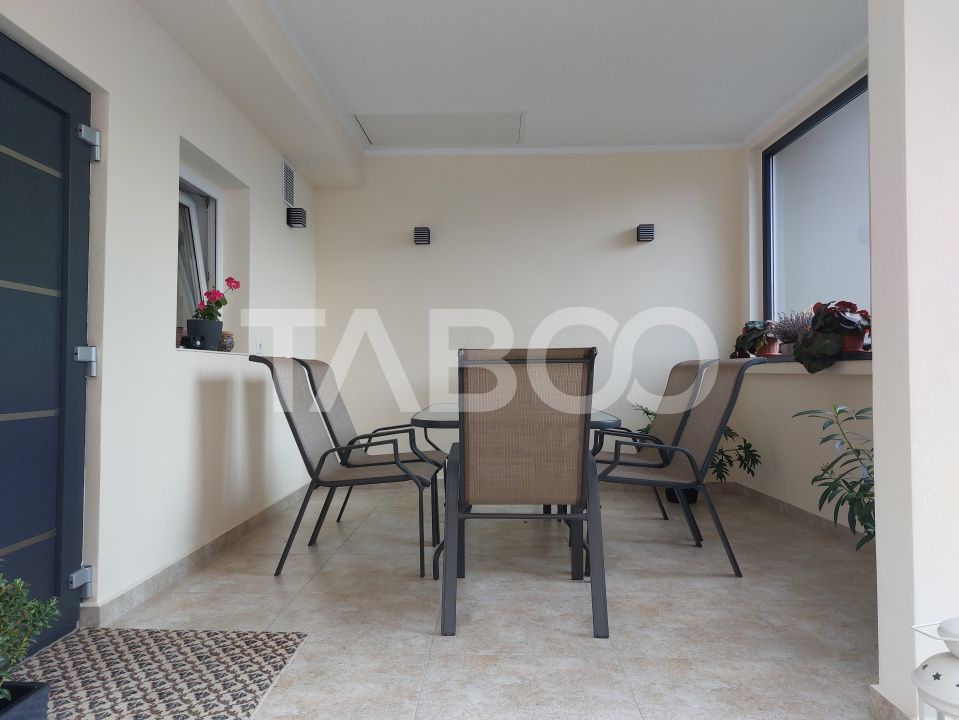 Casa 109 mp 4 camere pivnita terasa loc parcare curte comuna Cisnadie – fotografia 22 din 24
