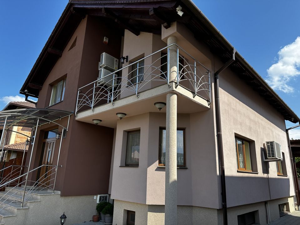 Casa D+P+M cu garaj teren 400 mp finisata utilata mobilata asfal CETATE Giro – fotografia 1 din 18