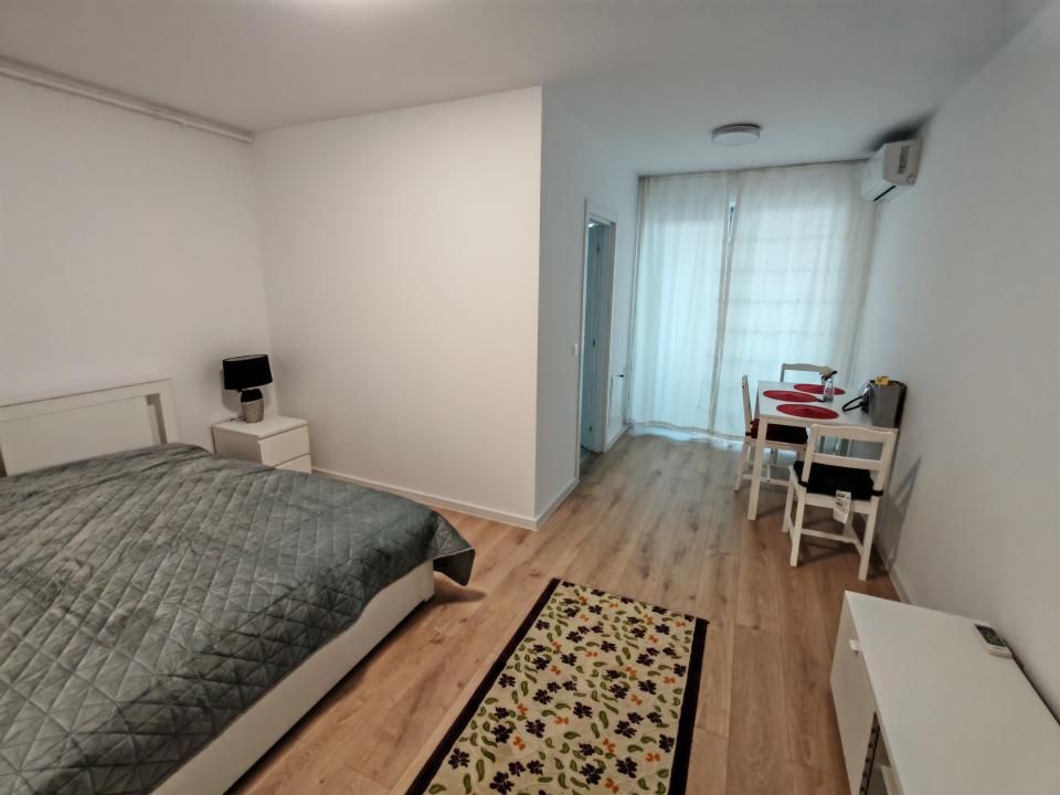 Inchiriere garsoniera si loc de parcare subteran in Hills Titanium – fotografia 1 din 10