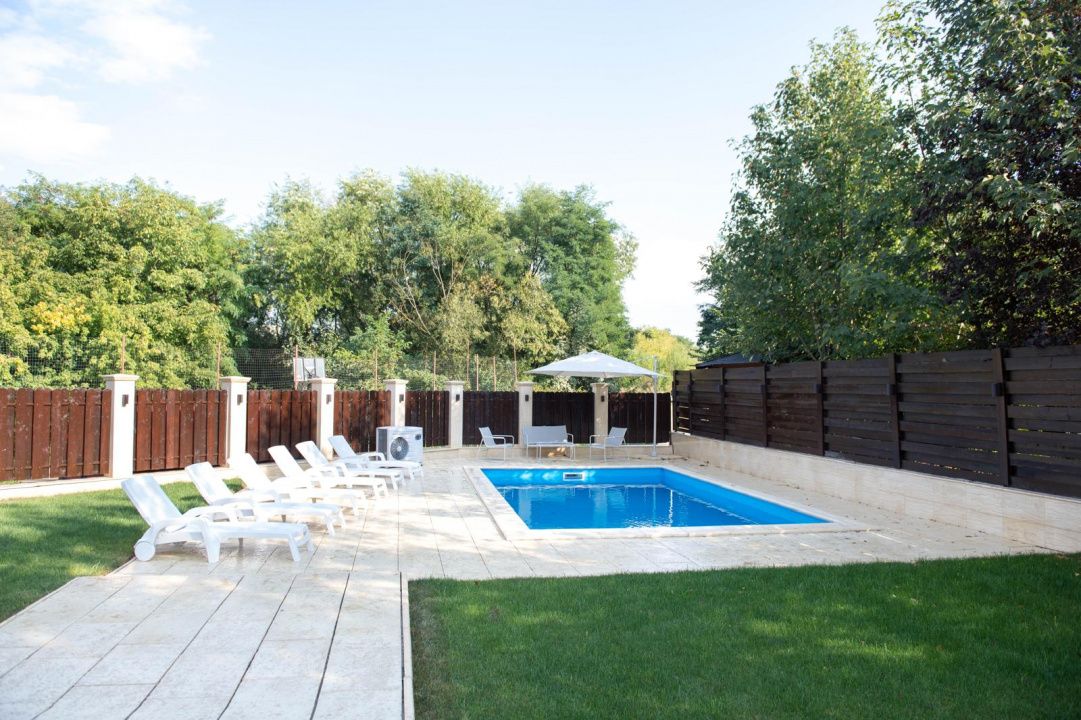 Casă superfinisată, complet mobilată, cu piscină încălzită – 5 camere, 5 băi – fotografia 19 din 20